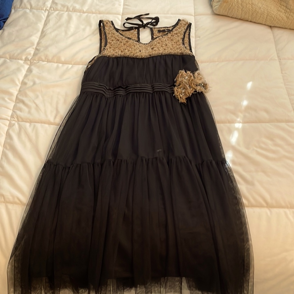 Black sleeveless dress by Rye